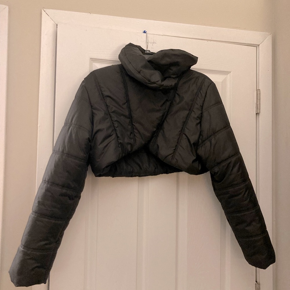 Short black puffer coat.